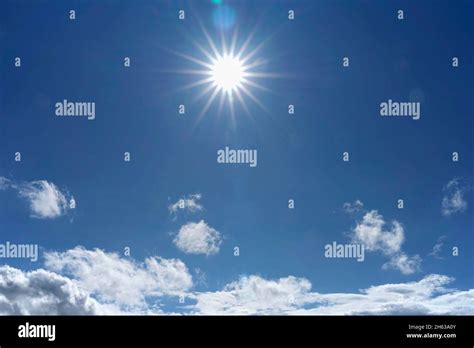 germanybavariasunsun starblue sky  clouds stock photo alamy