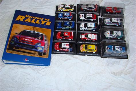 Altaya - Scale 1/43 - Lot with 14 rally cars and Album with - Catawiki