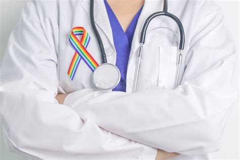 Doctor With Lgbtq Rainbow Ribbon For Support Lesbian Gay Bisexual Transgender And Community
