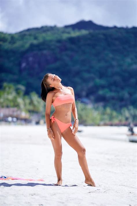 Girl In Red Swimsuit Posing At The Tropical Beach Stock Photo Image Of Coastline Brunette