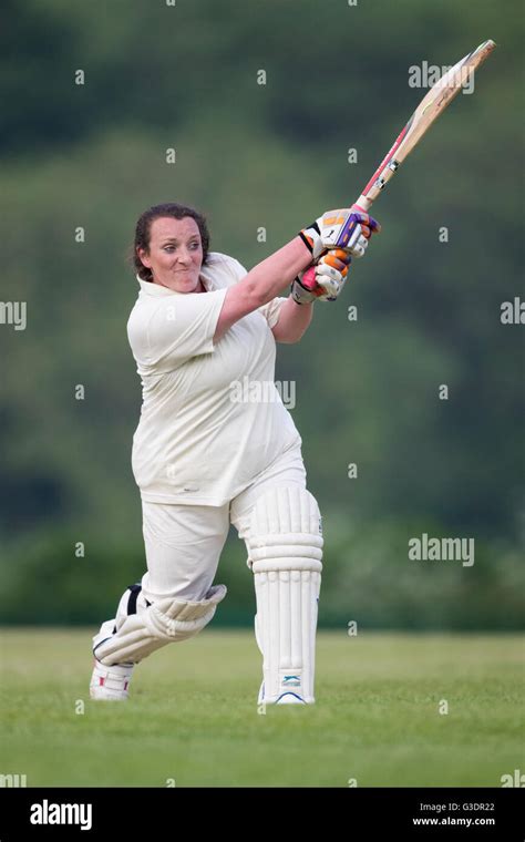 Female Cricket Batsman In Action Stock Photo Alamy