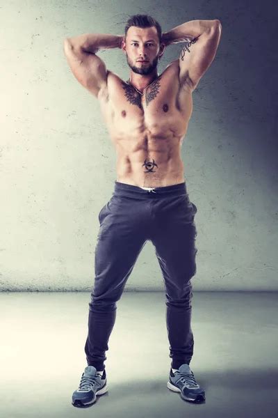Handsome Half Naked Muscular Man Standing Isolated Stock Photo Artofphoto