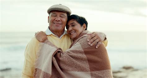 Senior Couple Hug And Happy At The Beach For Love Commitment And