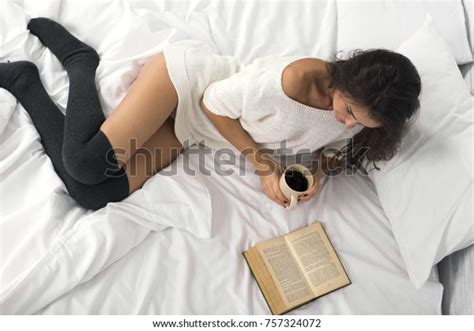 Attractive Brunette Woman Reading Book Holding 스톡 사진