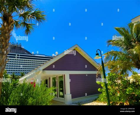 Beach On Ocean Cay Bahamas Island With A Colorful Houses And Turquoise