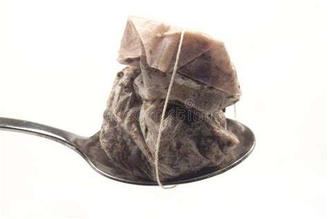 Spoon With Crushed And Used Tea Bag Stock Image Image Of Consumed