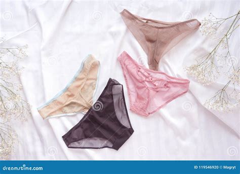 Fashion Trendy Lace Lingerie Different Panties On White Bed Background Beautiful Sets To