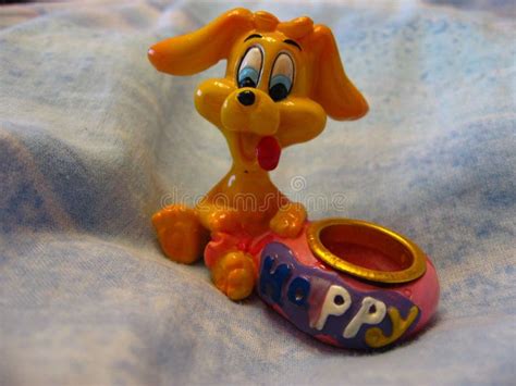 Cute Puppy With A Bowl Toy On A Blanket Stock Photo Image Of Puppy