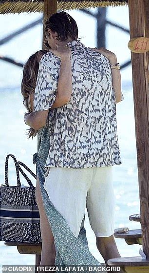 Abbey Clancy Displays Her Washboard Abs In A Frilly Bikini Daily Mail Online