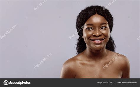 Portrait Of Beautiful Naked African Woman With Flawless Skin Over Grey Background Stock Photo