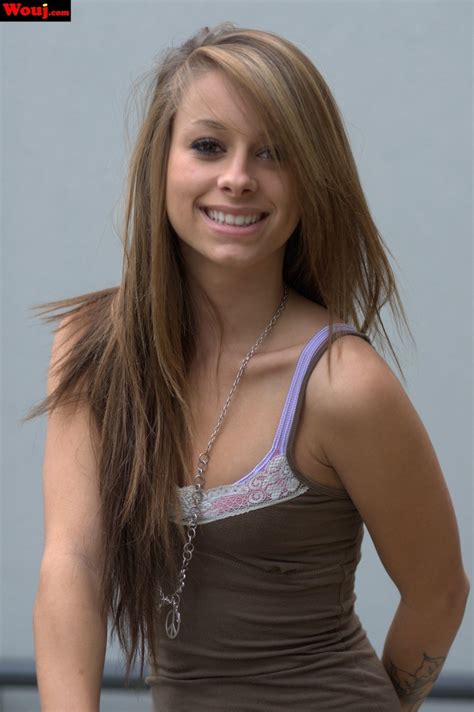 Amateur Babe With Arm Tattoos Poses Seductively Outdoors For The Camera Photos