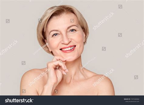 Naked Mature Blonde Woman Standing Isolated Stock Photo 1767638360 Shutterstock