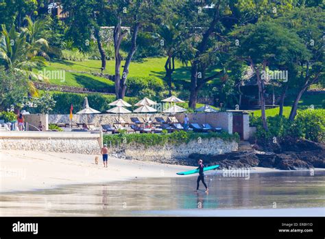 Surfers On A Beach Stock Photo Alamy