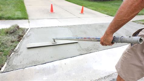 Resurfacing Vs Replacing A Driveway What To Know Top Coat Concrete