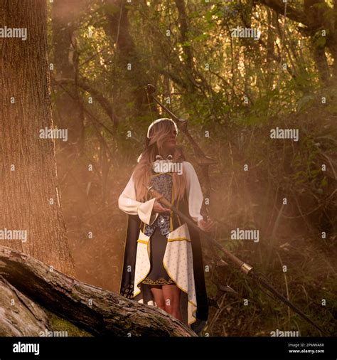 An Elf Blonde Woman Archer Of The Middle Ages In An Enchanted Forest Fantasy World 3d