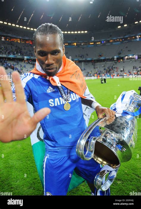 Chelseas Didier Drogba Celebrates With The Trophy During The Uefa