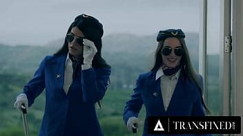 Transfixed Trans Flight Attendant Zariah Aura Fucks Hot Coworker Hazel Moore During Delayed