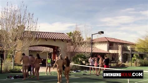 Swinger Couples Playing Naked Outside The Swing House On Summer Days