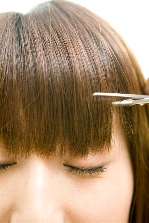 Video Of A Woman Cutting Her Bangs Shows That Sometimes Beauty