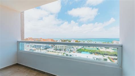 Open-Concept Ocean View Suite Featuring A Private Balcony & Two Full ...