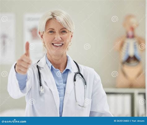 She Always Gives Good News A Mature Doctor Giving The The Thumbs Up Stock Image Image Of