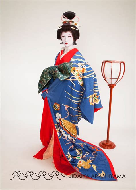 A Woman Dressed As A Courtesan At A Kimono Photography Experience