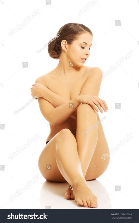 Nude Woman Sitting On Floor Stock Photo Edit Now