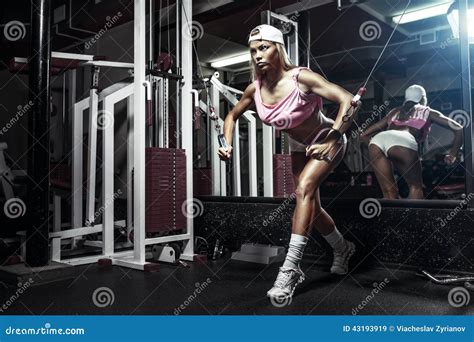 Fitness Blonde Woman Posing On Bench In The Gym Royalty Free Stock Photo CartoonDealer
