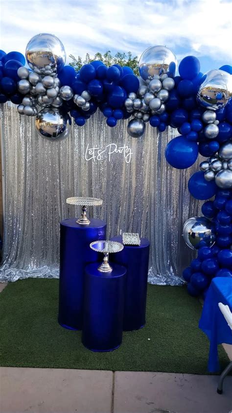 Blue And Silver Balloon Arch For An Event