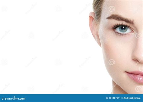 Pretty Girl With Blue Eyes And Blond Hair With Naked Shoulders Looking At Camera Smiling