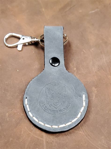 how to open apple tag holder