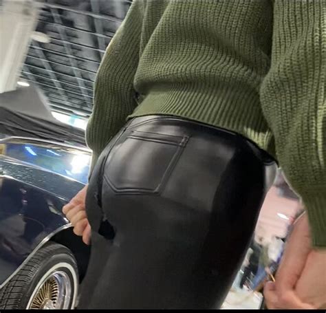 Attention Seeking Girl Presenting Her Ass In Ripped Leather Pants Spandex Leggings Yoga