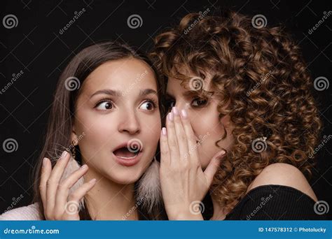 Shocked Brunette Posing While Friend Whispering Secret Stock Photo Image Of Angel Bright