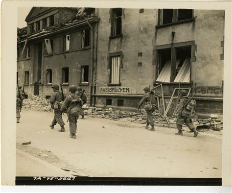 Infantrymen advancing through Zweibrucken, Germany, 1945 | The Digital ...