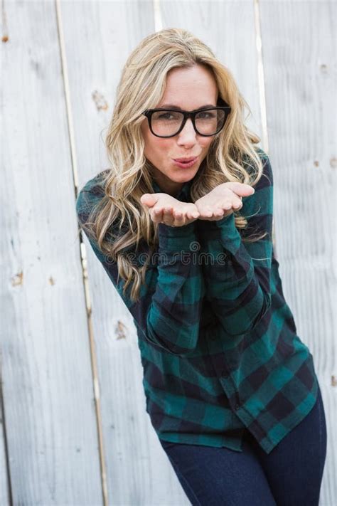Pretty Blonde In Striped Shirt Blowing A Kiss Stock Photo Image Of Flirty Posing 49264412