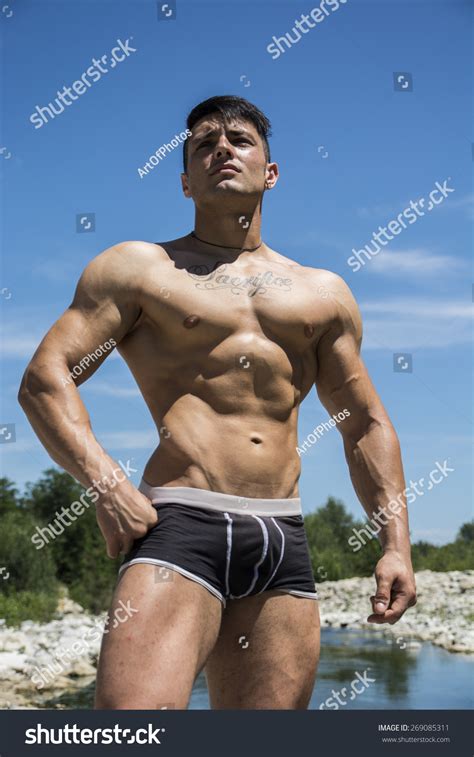 Handsome Hot Young Bodybuilder Shirtless Trunks 스톡 사진