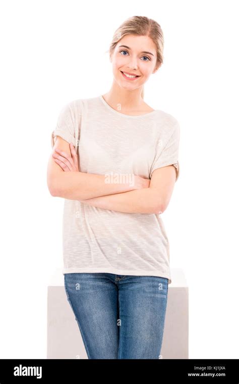 Beautiful Blonde Girl Smiling And Standing Over A White Background Stock Photo Alamy