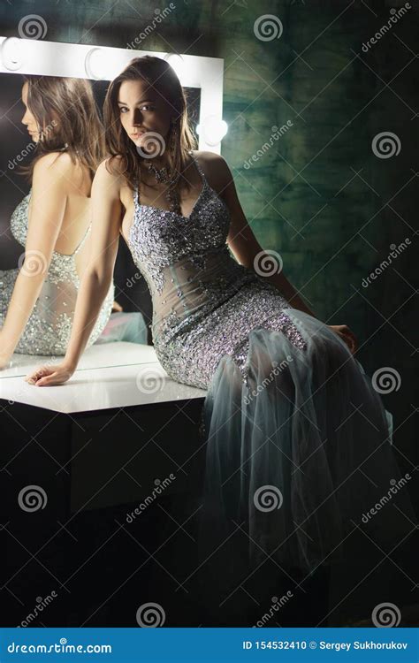 Alluring Brunette Posing In A Studio Stock Photo Image Of Elegance Mirror