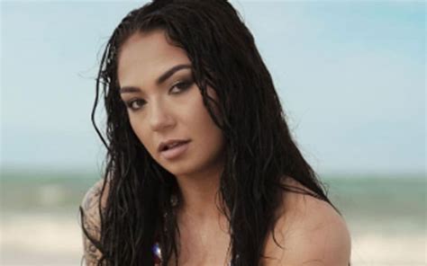 Skye Blue Holding Out For Better Weather In Red Bikini Snap