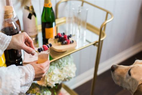 Prettiest Mimosa Bar With Frosted Berry Garnishes To Have To Host