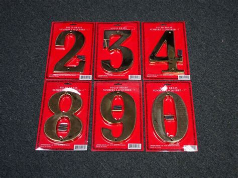 7 Large Polished Brass House Numbers