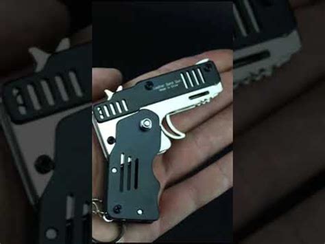 Складной пистолет стреляющий резинками с алиэкспресс - YouTube