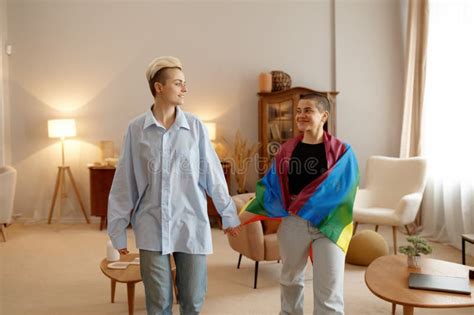 Charming Lesbian Woman Couple With Rainbow Flag Sharing Loving Time With Fun Stock Photo Image