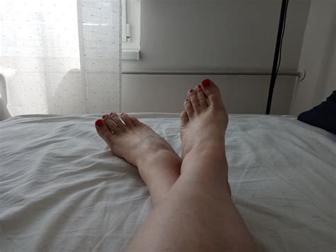 MILF Tranny Shows Off Her Feet With Red Painted Toes 5 Pics XHamster