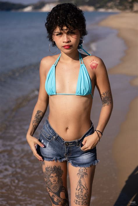 Good Looking Lilith Baph With Natural Tits Hot As Posing Naked On A Beach Photos