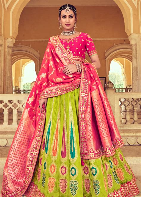 Woven Zari Banarasi Silk Lehenga Choli In Green And Pink