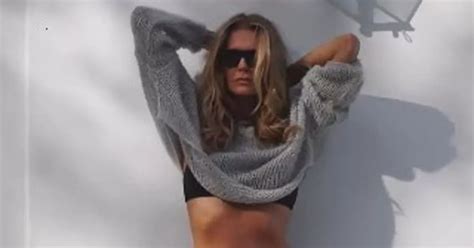 Supermodel Elle Macpherson Shows She Still Has The Body In Black String Bikini Mirror Online