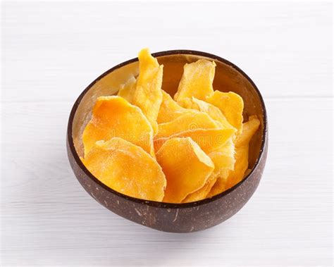 Dehydrated Mango Slices And Fresh Raw Mango Isolated On White Dried