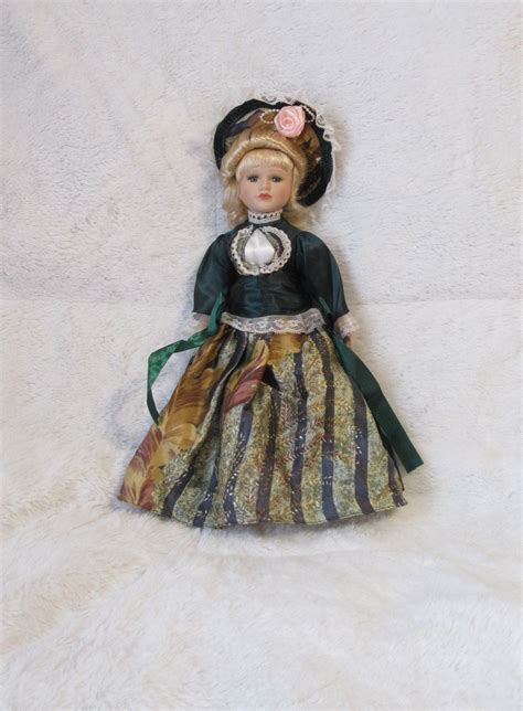 VINTAGE Porcelain Doll Blonde Bun Emerald Dress Etsy