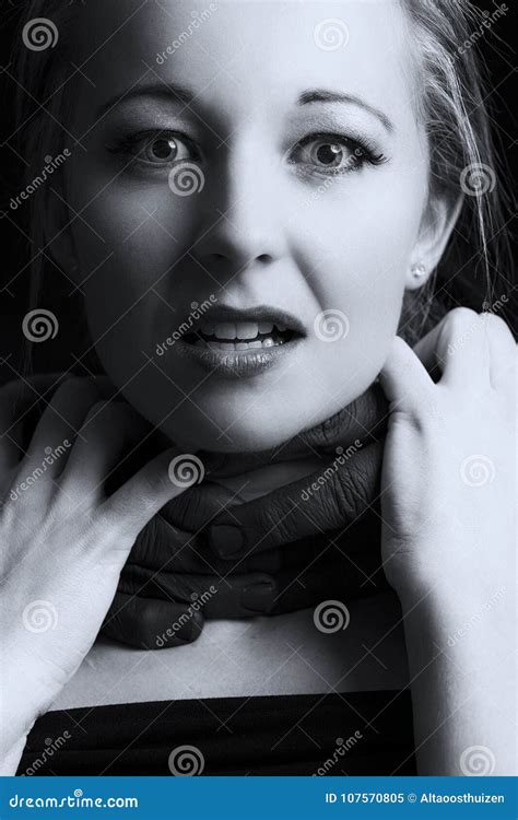 Frightened Blonde Woman Grabbed By Black Hands On Her Face Artistic Conversion Stock Image